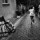 A boy runs by a pile of life vests for sale on the streets of central Izmir. Sept. 20, 2015.